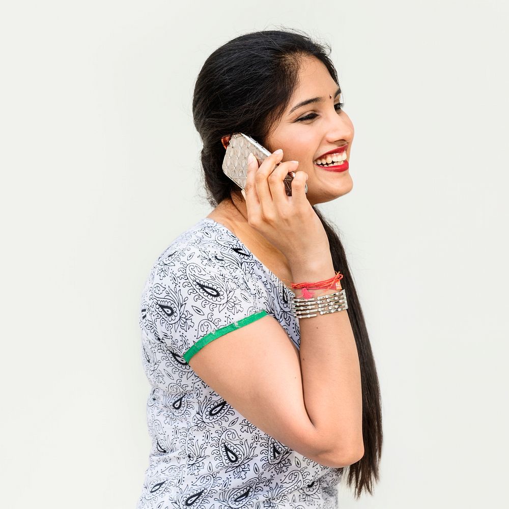 Indian woman is talking on the phone