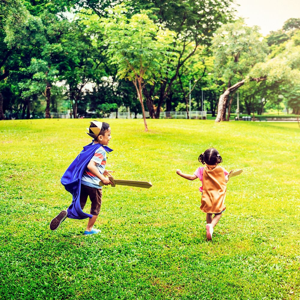 Siblings Playful Dressup Park Concept