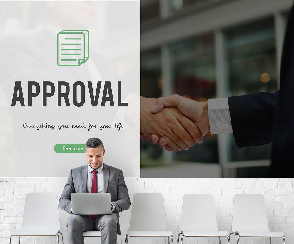 Approval word on business handshake background