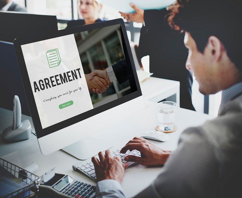 Agreement word on business handshake background