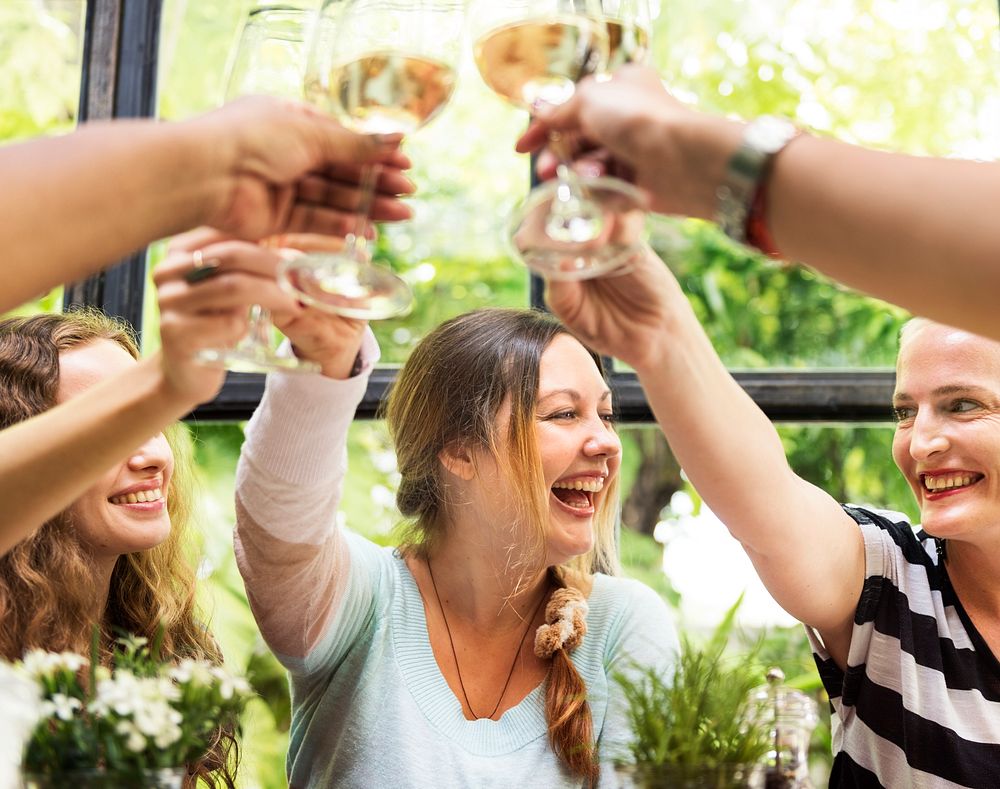 Women celebrating with wine