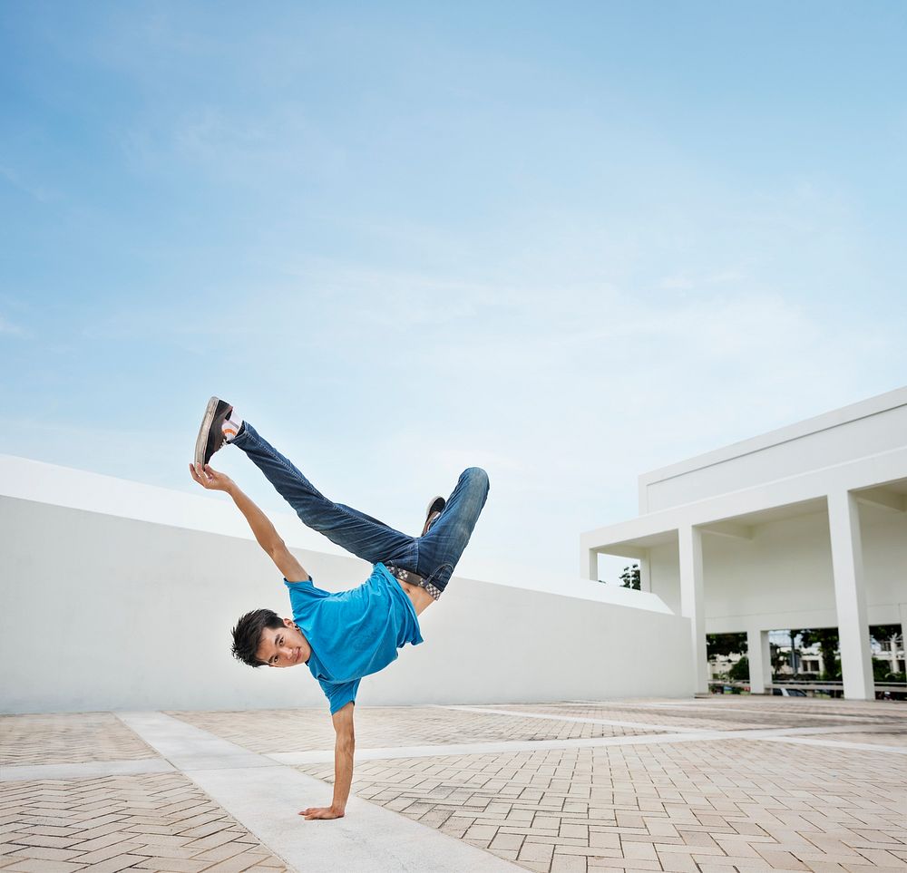 Young man breakdancing