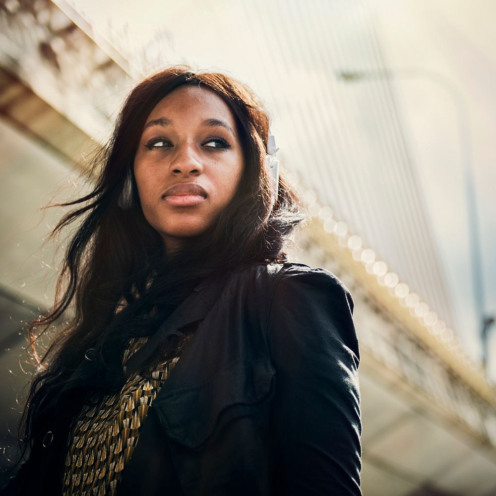 African American woman is listening to music