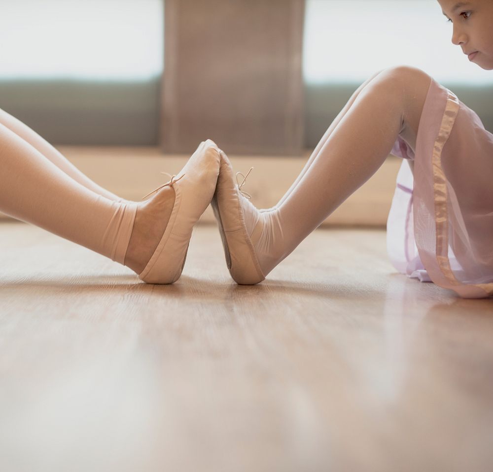 Ballerina feet against each other's