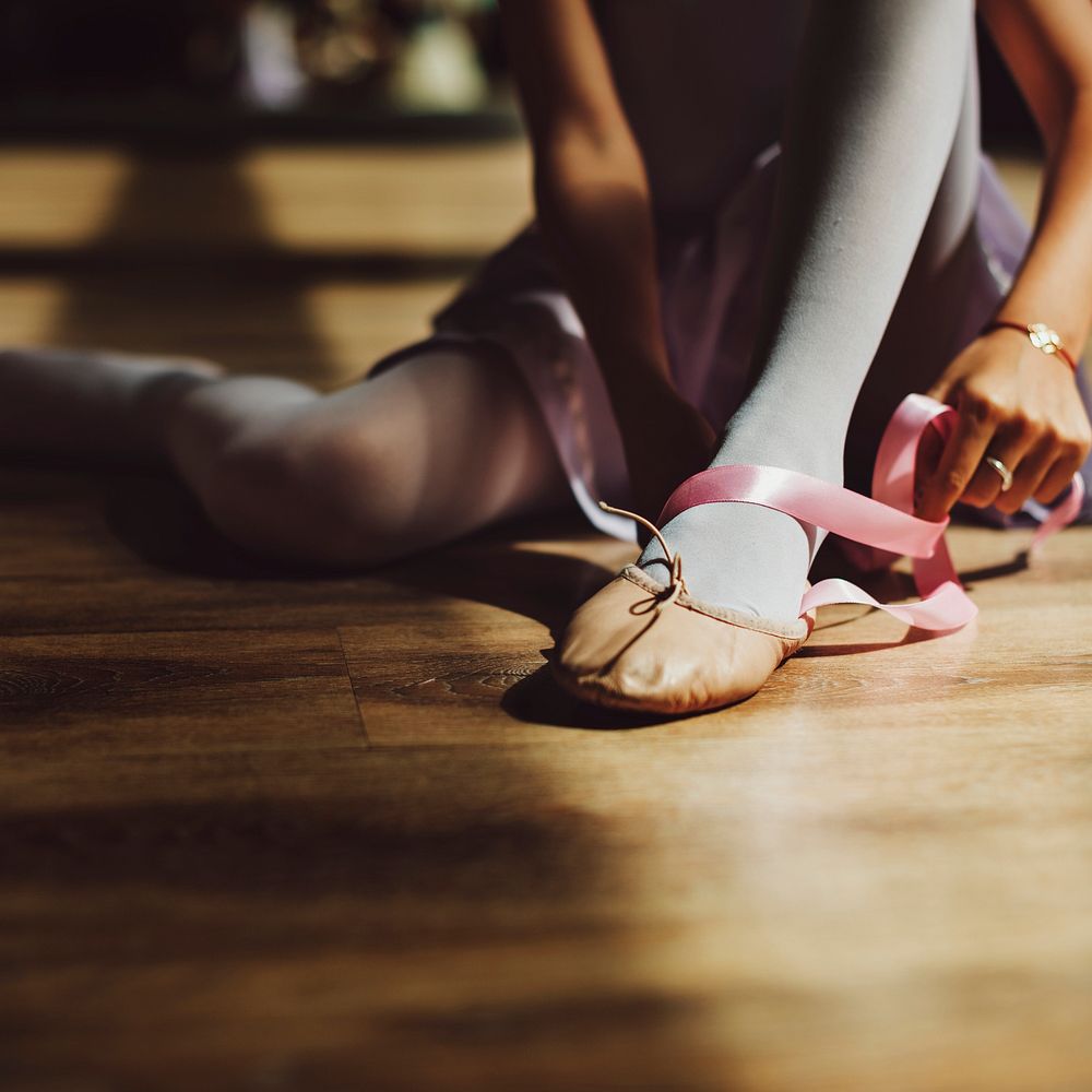 Young ballerina's feet wearing ballet shoes