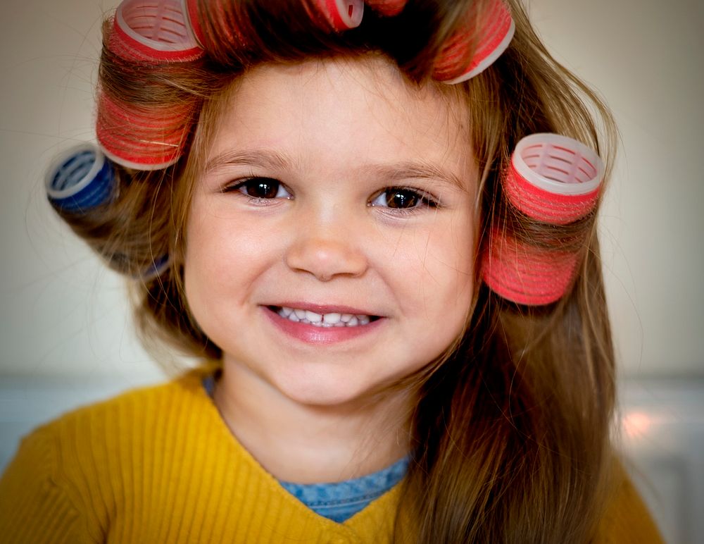 Cute little girl having a trendy hairstyle makeover