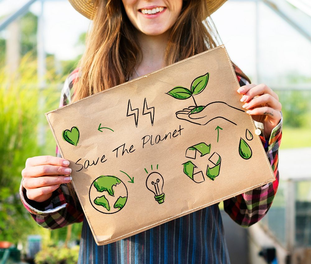 Farmer woman holding go green banner