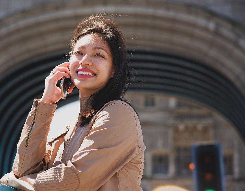 Beautiful asian woman on the phone