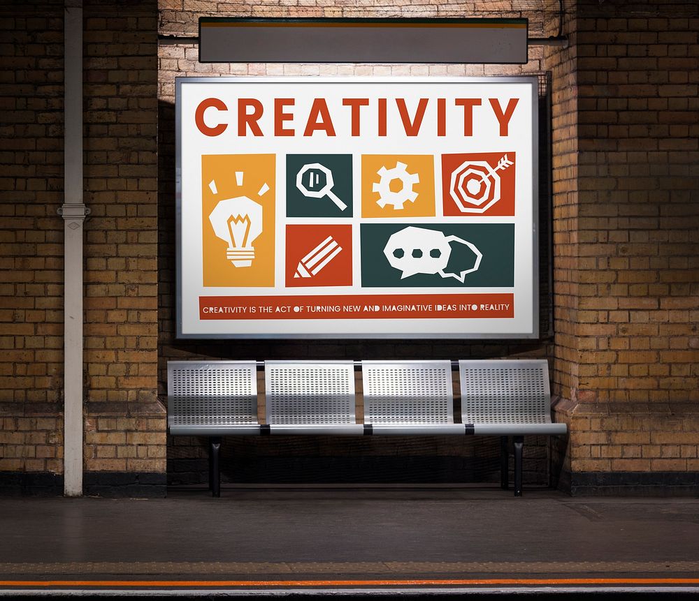 Different creative icons posted in a subway station