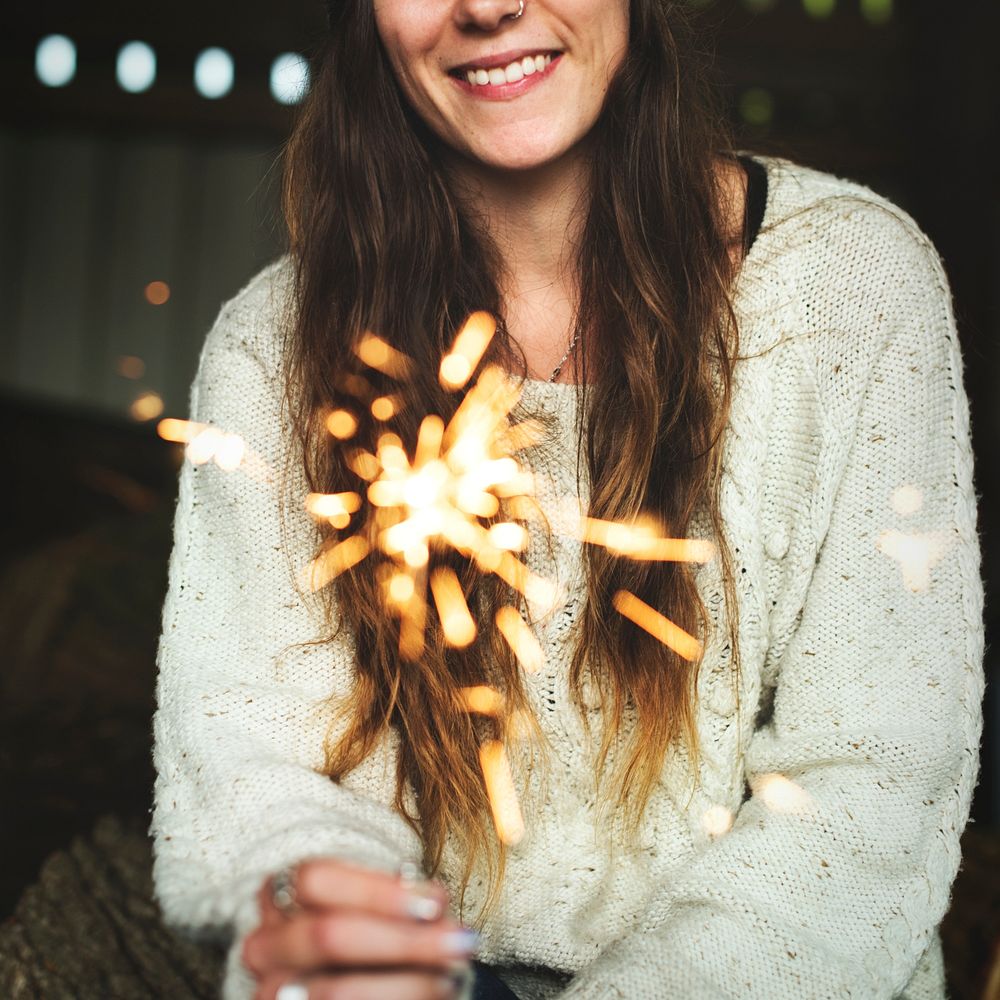 Woman enjoy sparkler