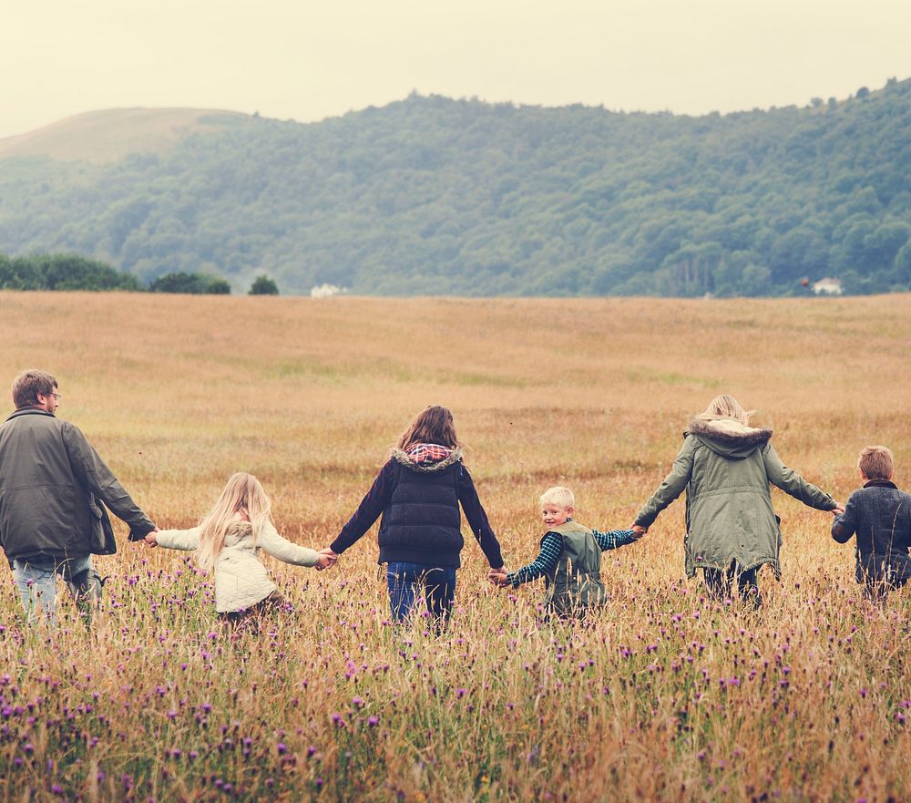 Family Walking Field Nature Togetherness Concept