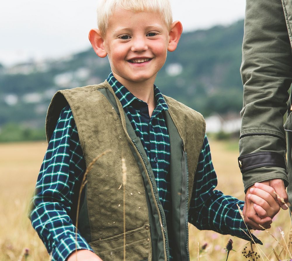 Family Father Son Smiling Togetherness Outdoors Concept