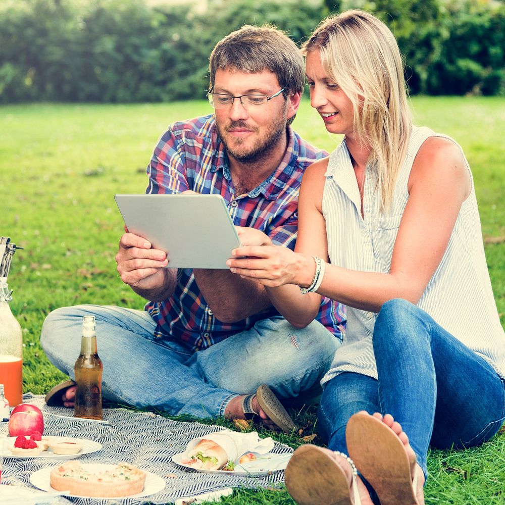 People Picnic Togetherness Relaxation DIgital Tablet Technology Concept