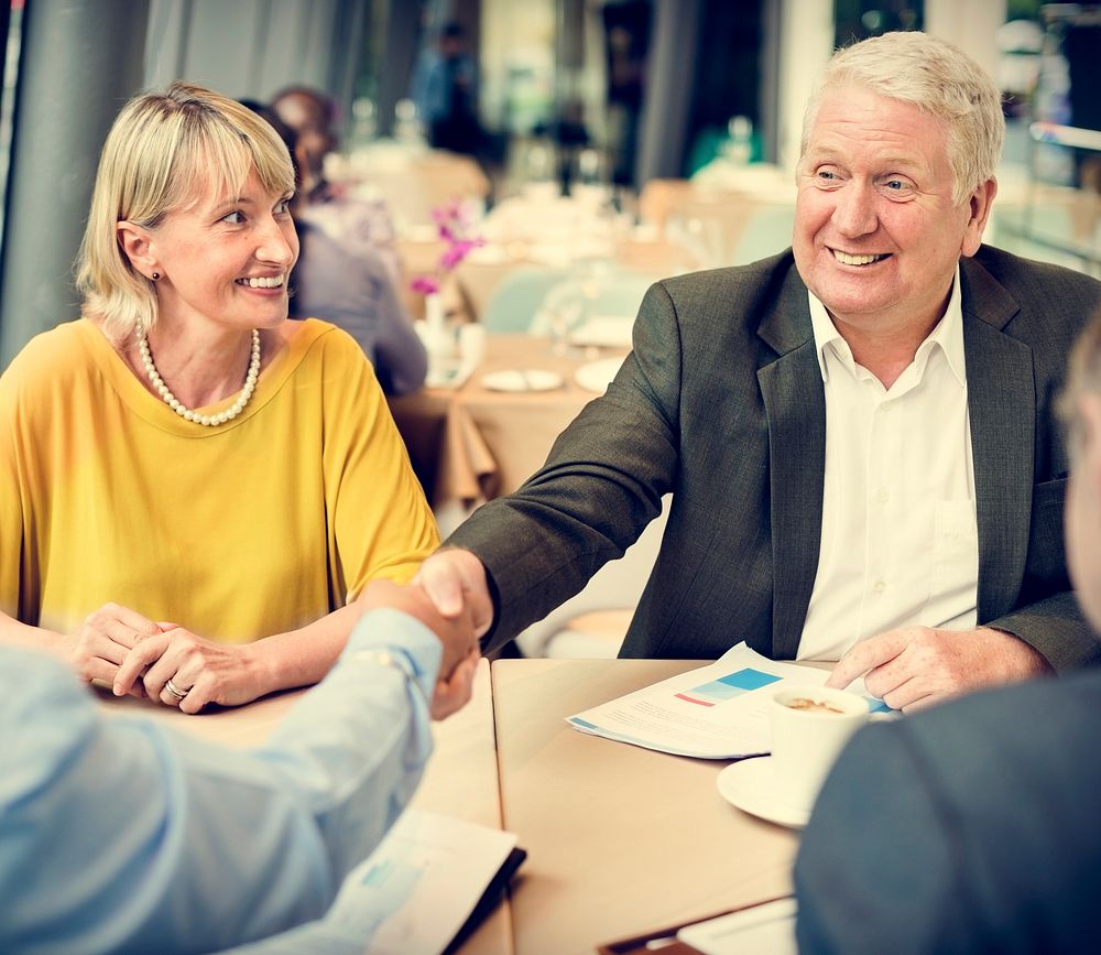 Business People Shaking Hands Agreement Concept