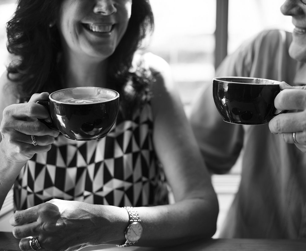 Mature couple enjoying coffee together