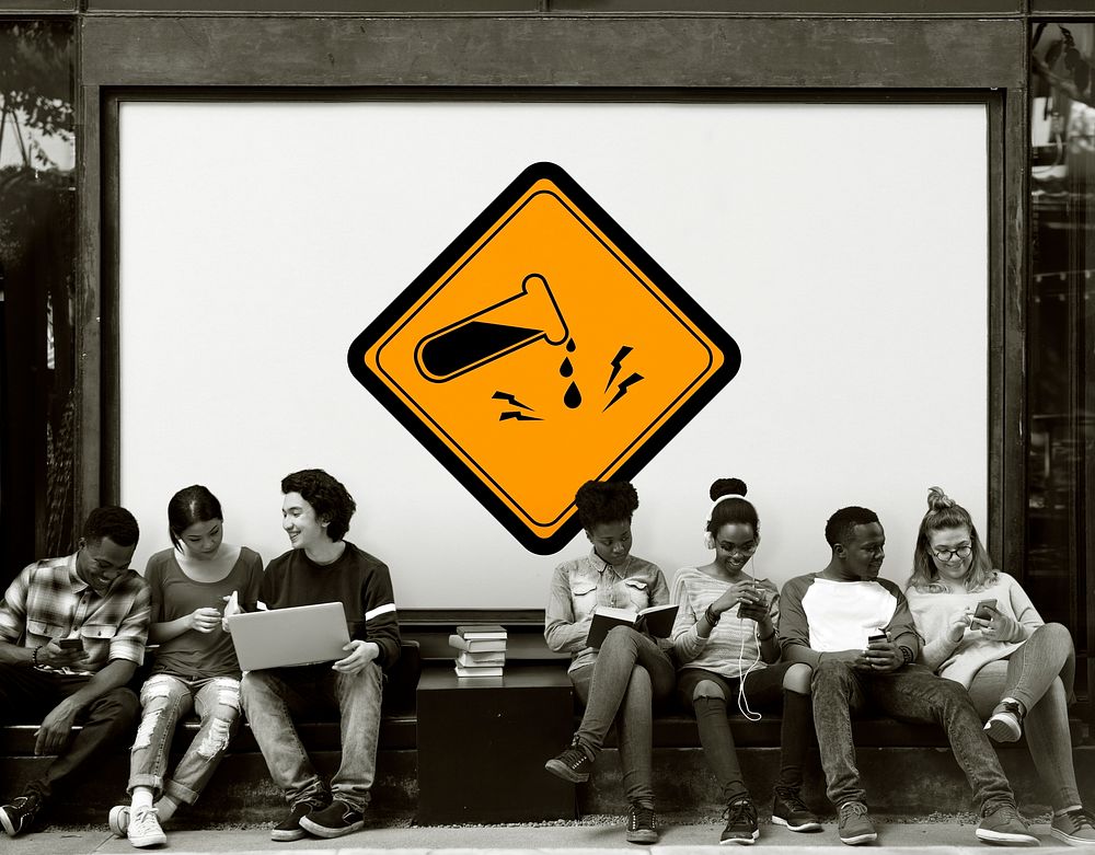 Group of Friends Sitting Together with Chemical Danger Attention Banner Behind