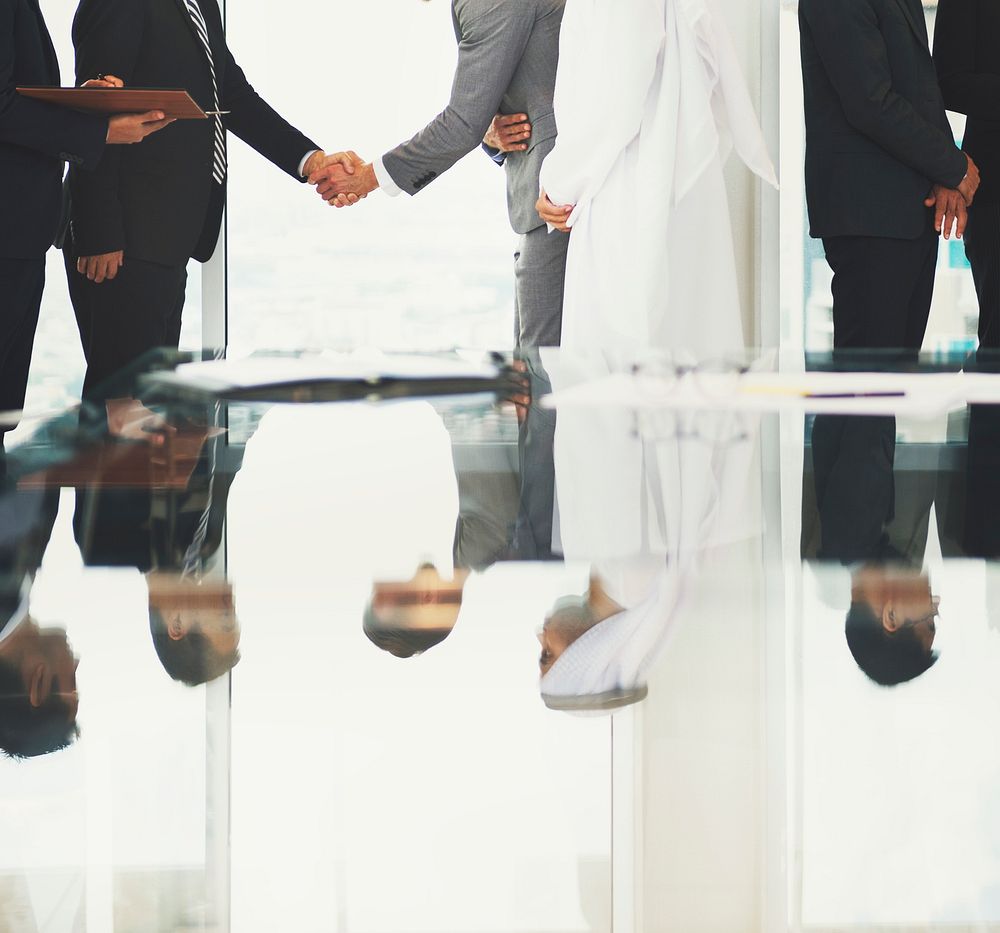Corporate business people handshaking