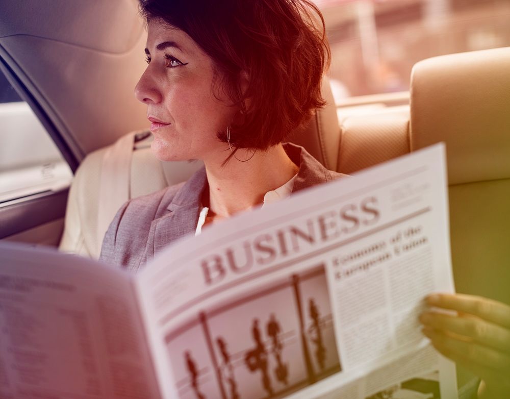 Photo Gradient Style with Businesswoman Reading Newspaper Car Inside