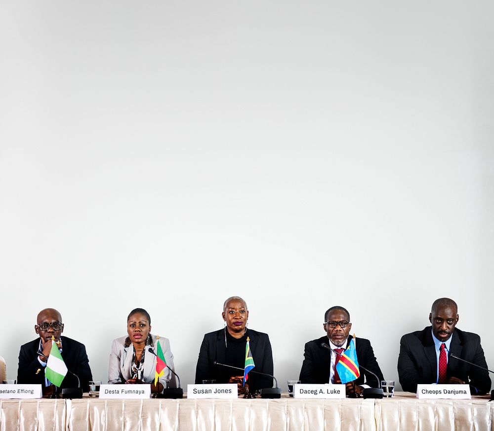 A Group of Business People Participating in a Panel Discussion 