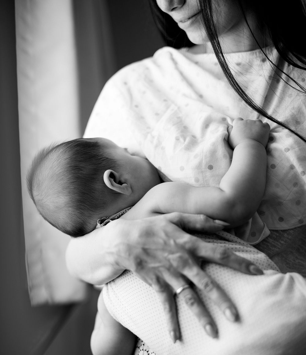 Mom feeding her baby