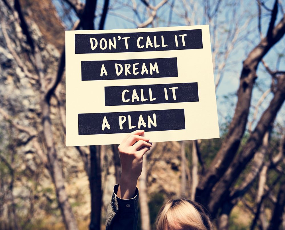Young Woman Hands Holding Blank Paper with Life Motivation Phras
