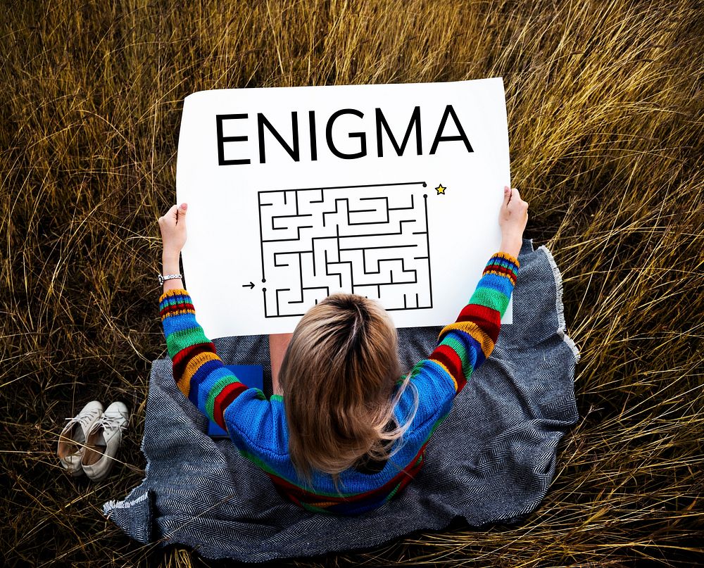 Woman holding enigma concept card