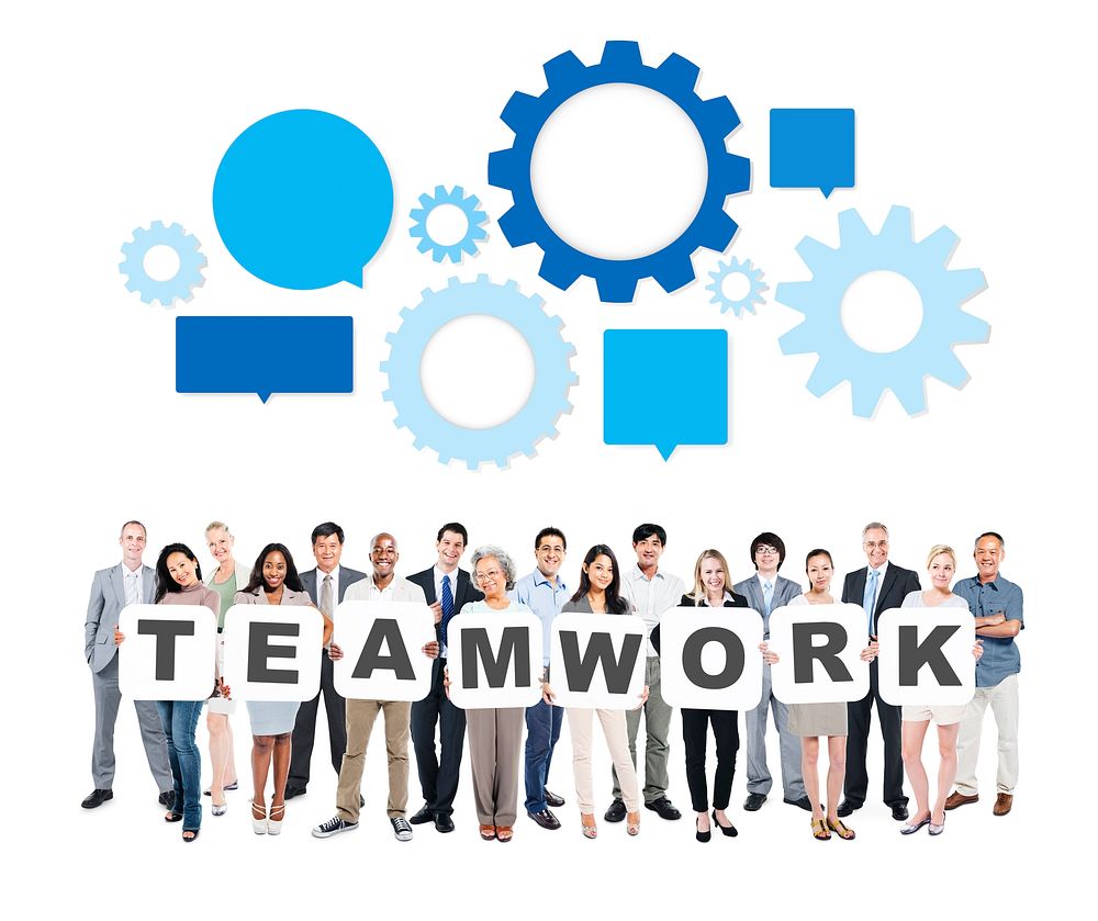 Group of Multi-Ethnic Business People Holding Letters To Form Teamwork And Speech Bubbles With Gears Above