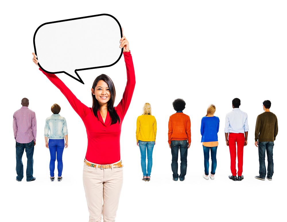 Back View of Multi-Ethnic People and a Woman at Front Holding Empty Speech Bubble