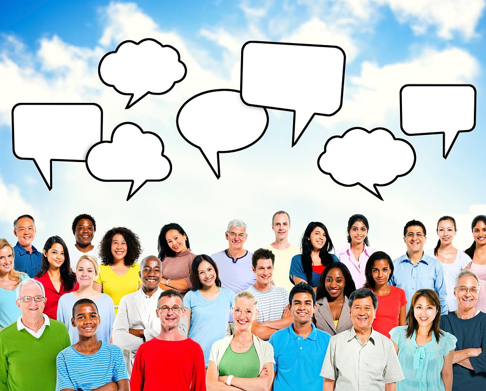 Group of multi-ethnical people standing beneath the blank speech bubbles.