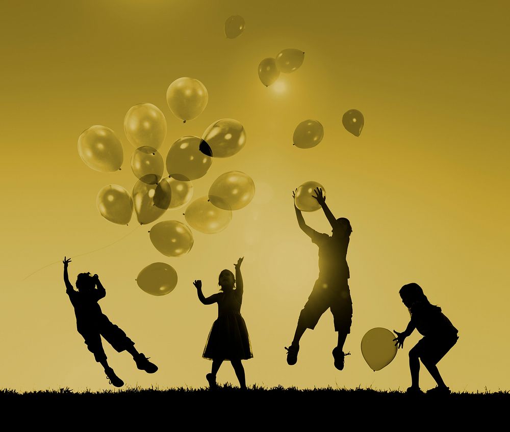 Children Outdoors Playing Balloons Together Concept