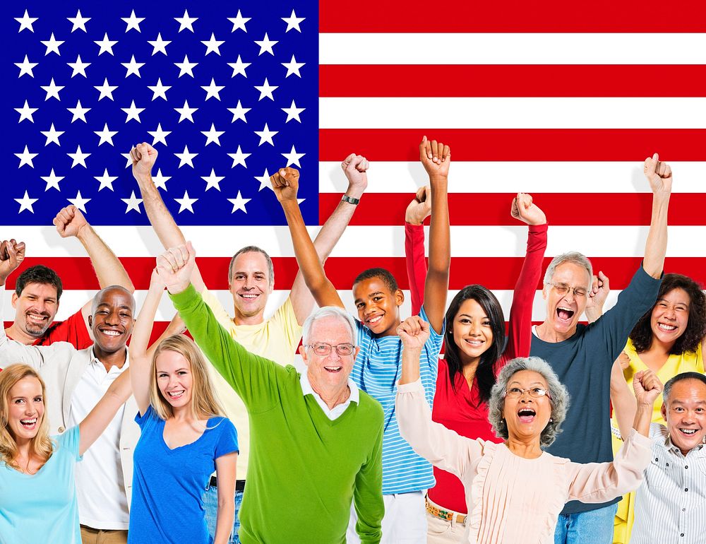 Group Of Multi-Ethnic People Expressing Positivity With Arms Raised And American Flag As A Background.