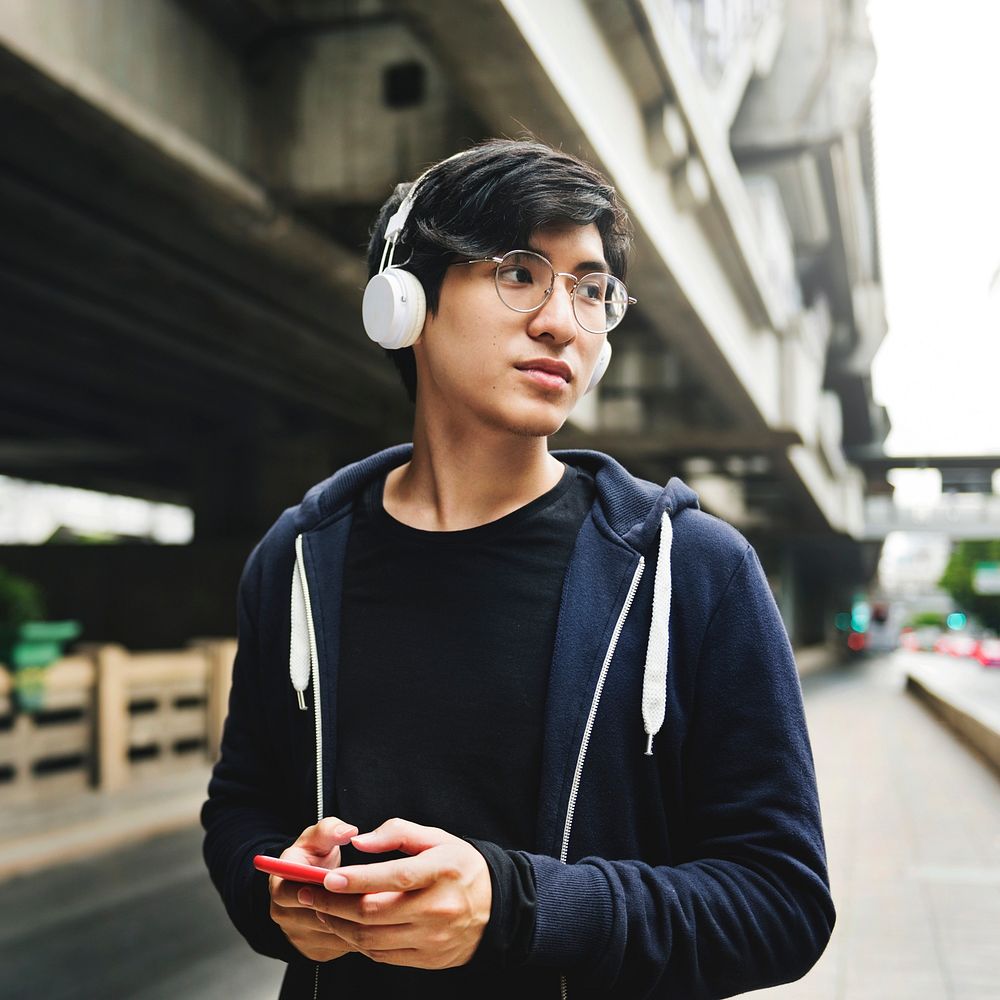 Guy listening to music on his phone