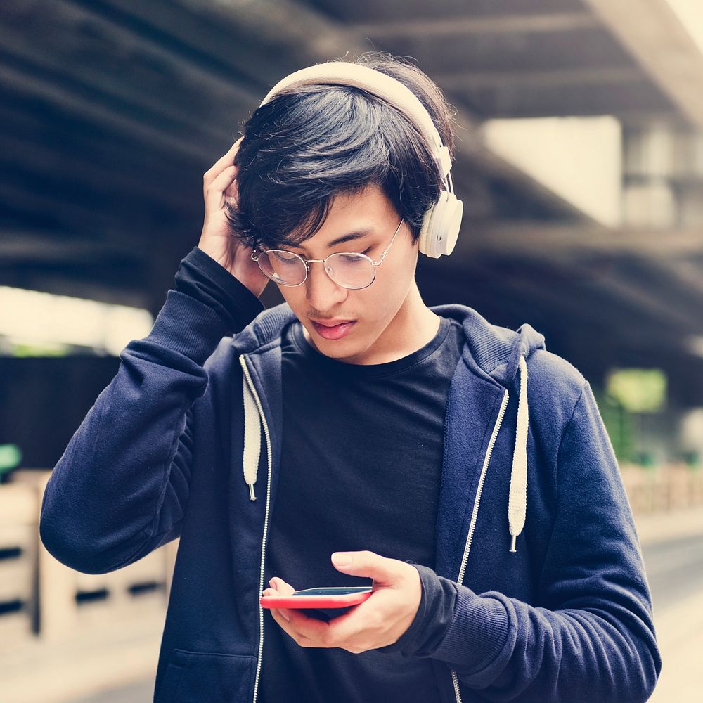 Asian Guy Listen to Music Headphones