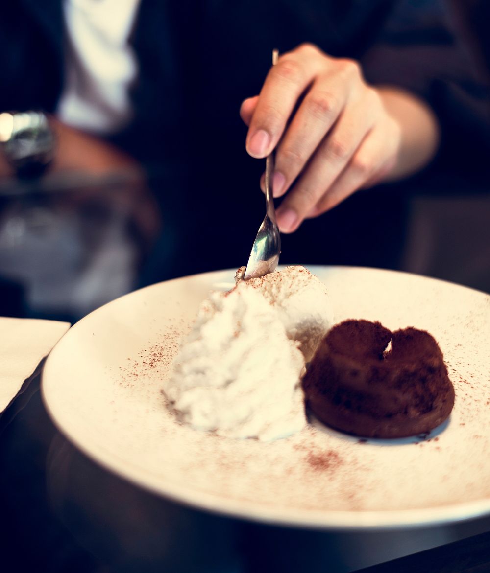 Chocolate lava cake with ice cream and whip cream sweet dessert