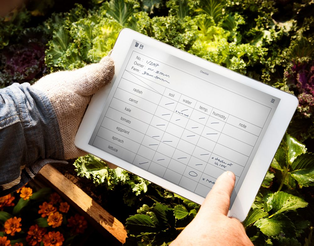 Man Holding Tablet Control Crop Plan List