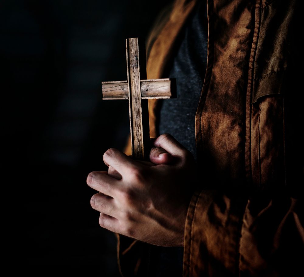 Woman Hands Holding Cross Praying for God 