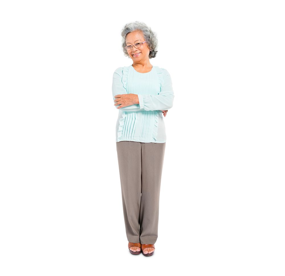 Confident Senior Woman Standing with Arms Crossed