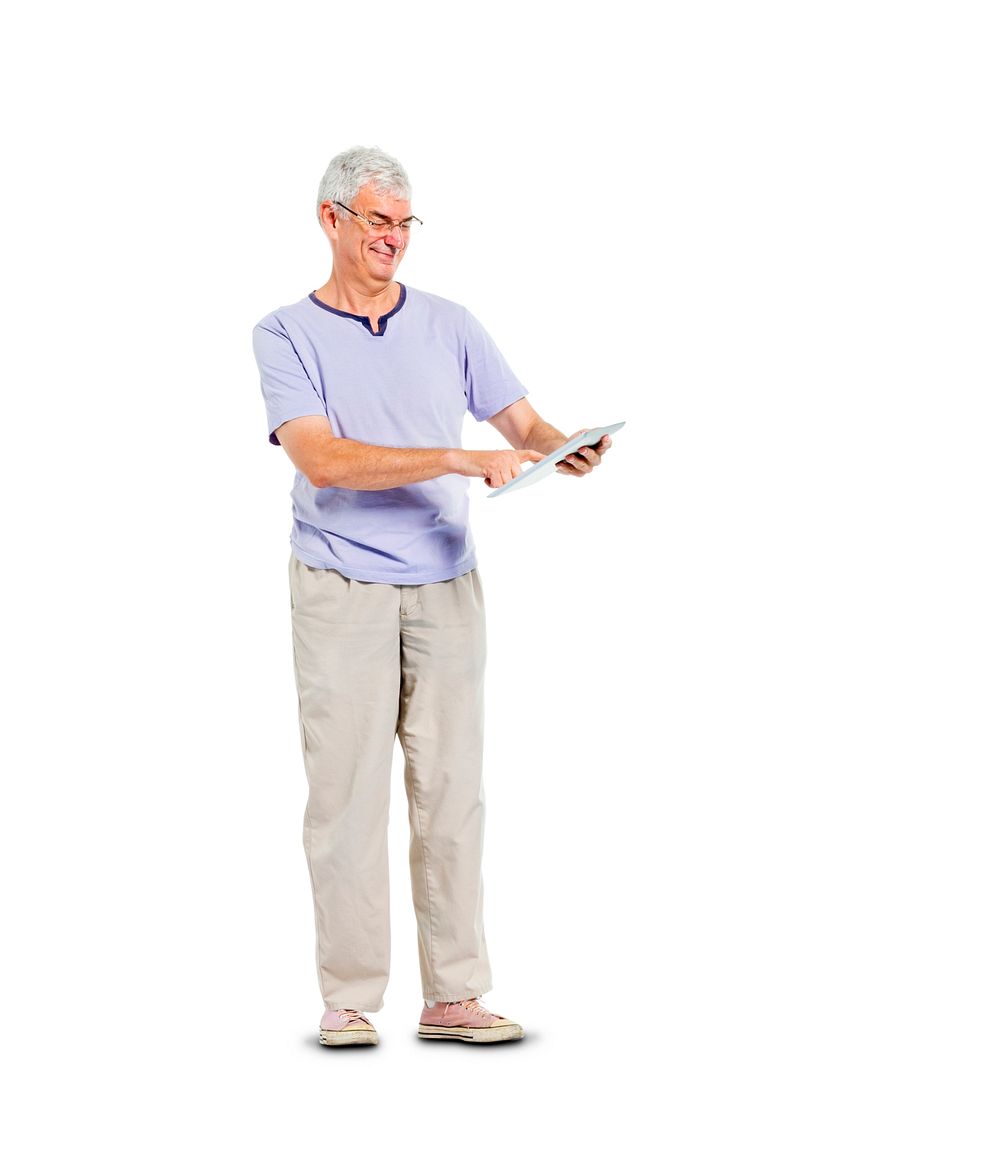 A Casual Mature Adult Man Using his Digital Tablet while Standing
