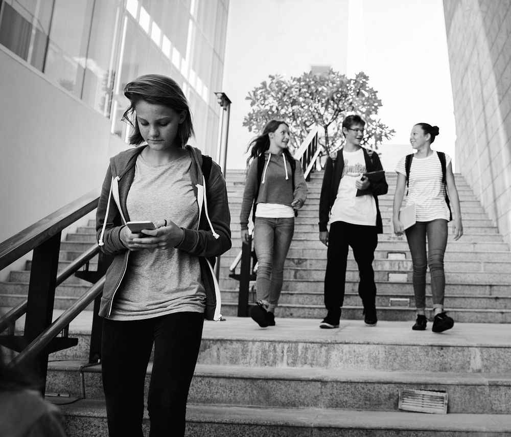 Group of students walking in the school