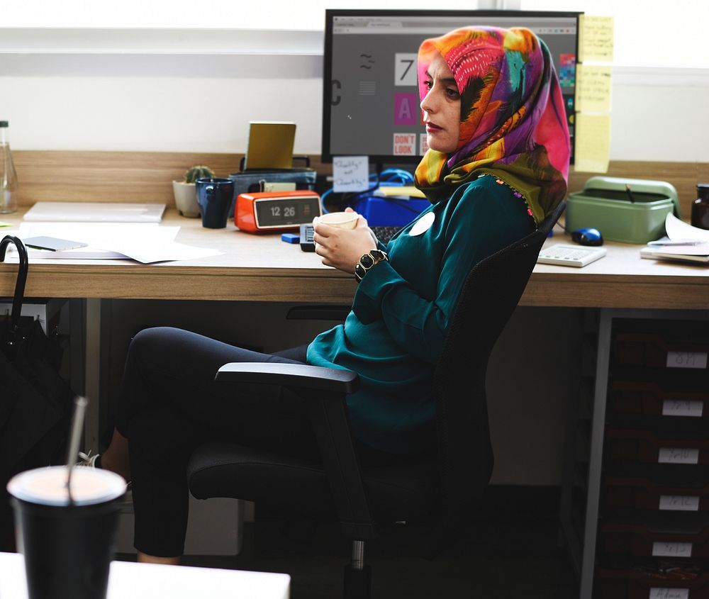Muslim woman working at the office