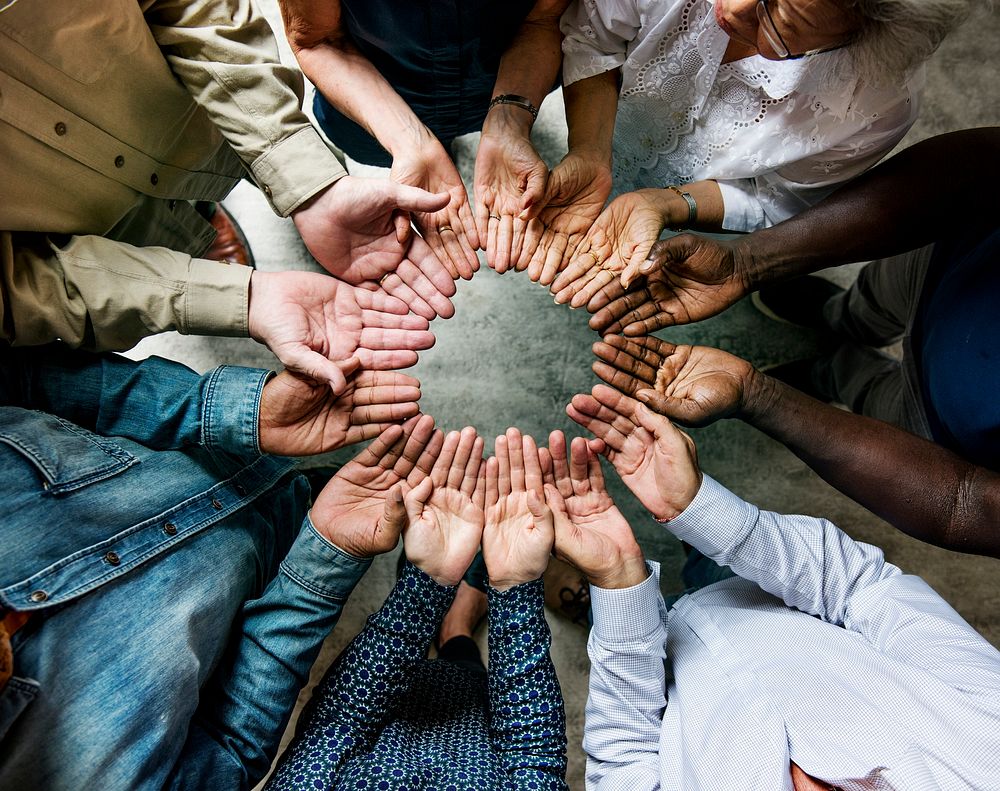 Group of diverse hands in a circle