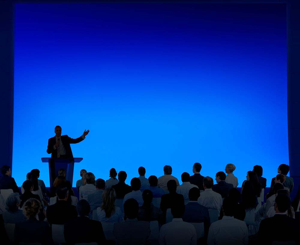 Large group of business people at a conference