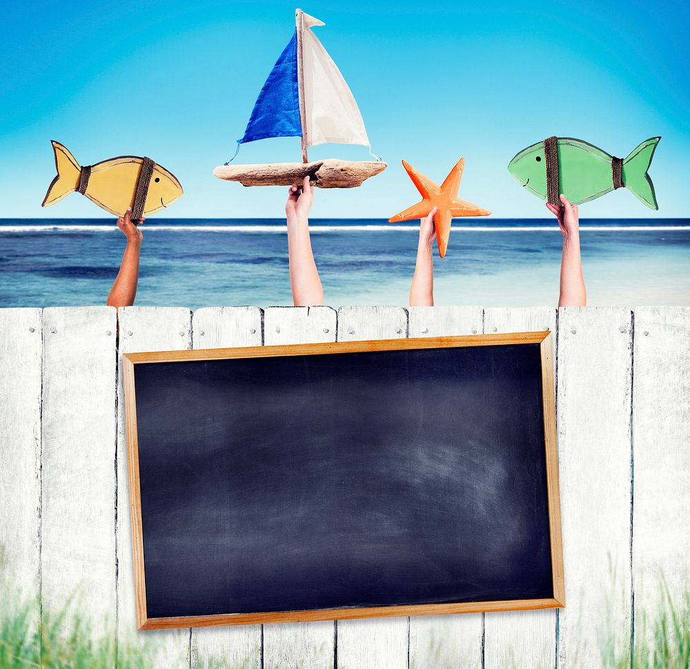 Empty Black Board on White Fence with Hands Holding Objects