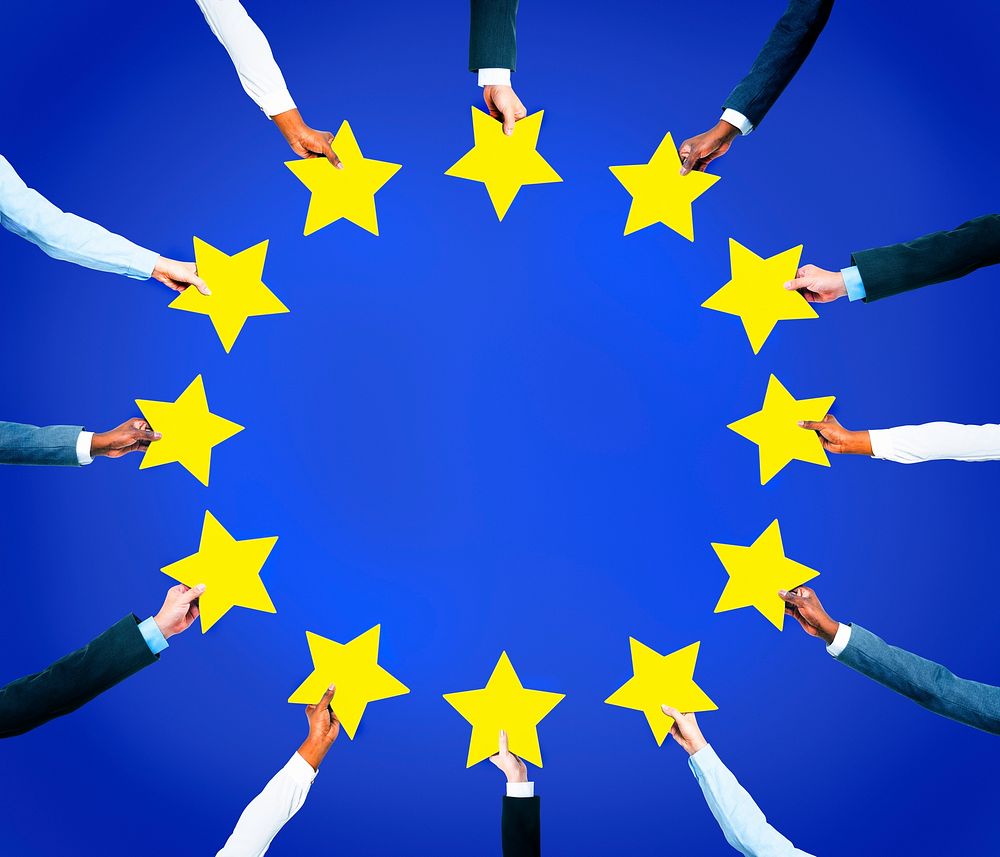 Multi-Ethnic Business People's Hands Holding Stars Circularly To Form A Flag Of EU.