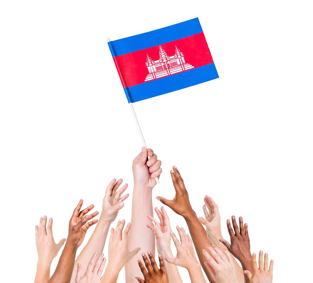 Group Of Multi-Ethnic People Reaching For And Holding The Flag Of Cambodia