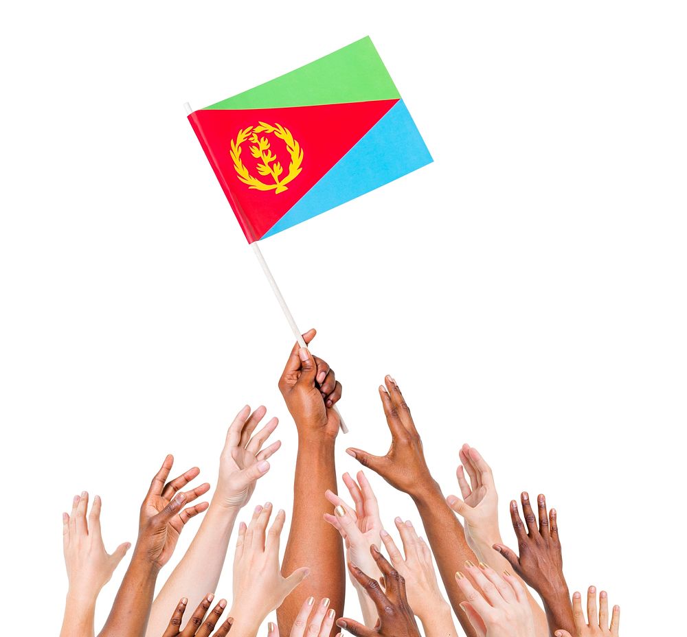 Group Of Multi-Ethnic People Reaching For And Holding The Flag Of Eritrea