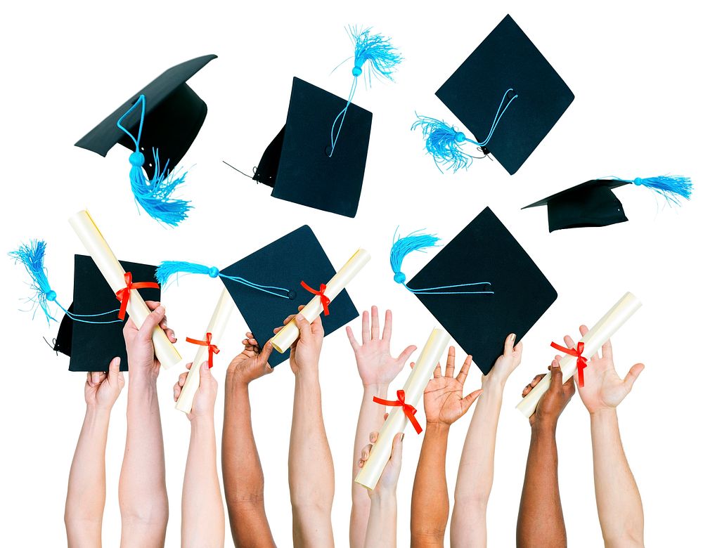 Multi-ethnic group of people holding certificate and throwing graduation cap.
