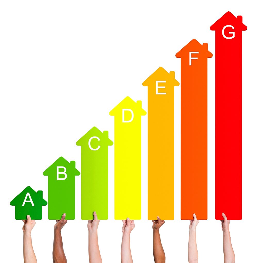 Multi-ethnic people holding house energy graph.