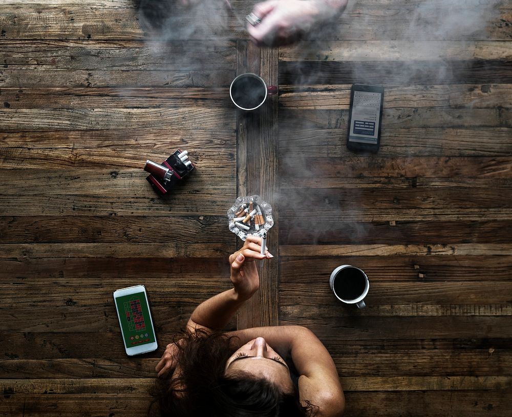Aerial view of people smoking at the table