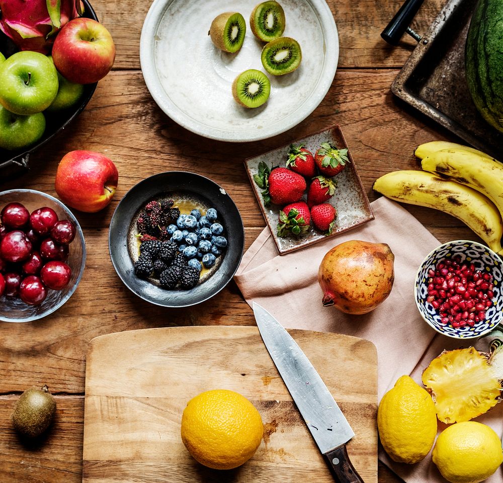 Various of fresh fruits on wooden table